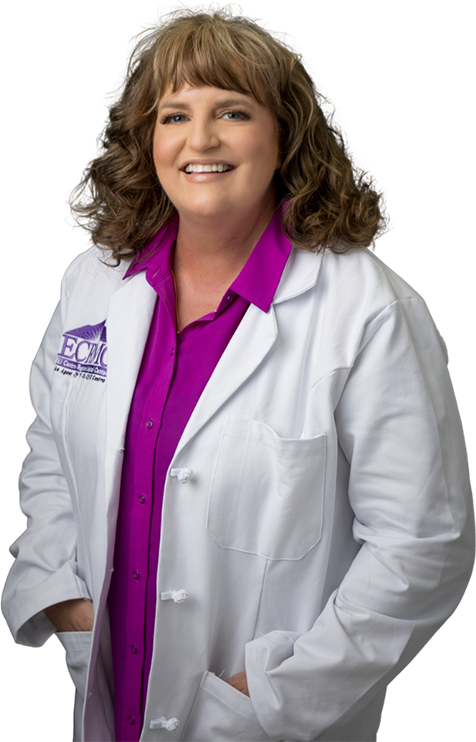 A woman in a lab coat and purple shirt.